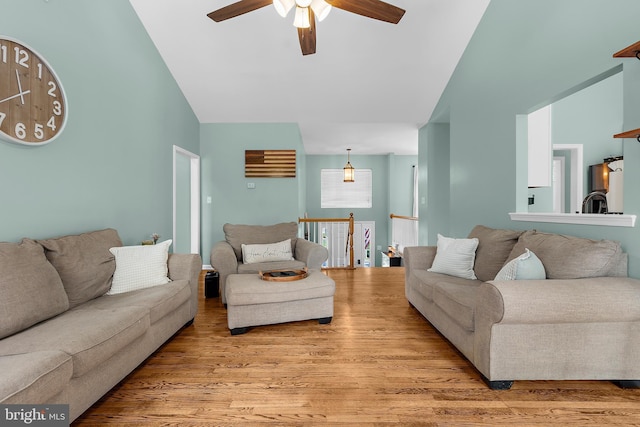 11312 Rawhide Rd, Lusby, MD 20657 - living room featuring light wood-style floors, a ceiling fan, and high vaulted ceiling