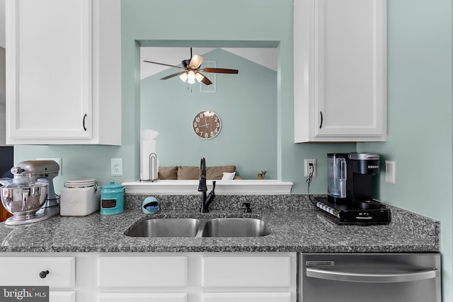 11312 Rawhide Rd, Lusby, MD 20657 - kitchen with ceiling fan, vaulted ceiling, dishwasher, a sink, and white cabinetry