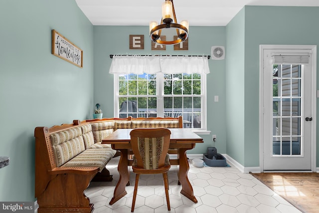 11312 Rawhide Rd, Lusby, MD 20657 - dining area featuring a chandelier and breakfast area