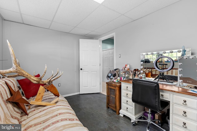 11312 Rawhide Rd, Lusby, MD 20657 - office space featuring a drop ceiling and dark wood-type flooring