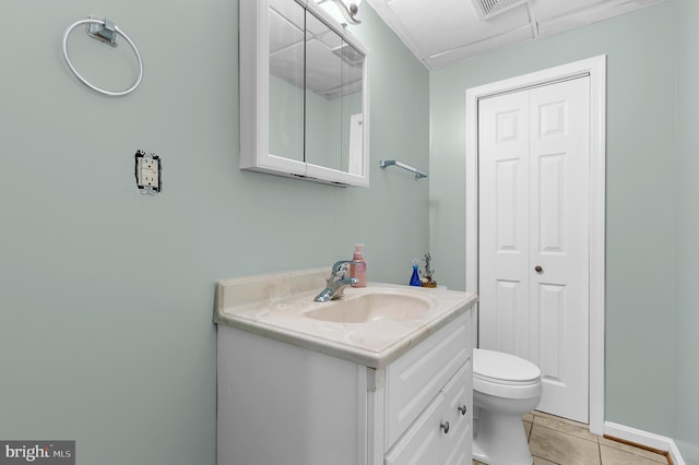 11312 Rawhide Rd, Lusby, MD 20657 - bathroom with tile patterned flooring, visible vents, toilet, and vanity
