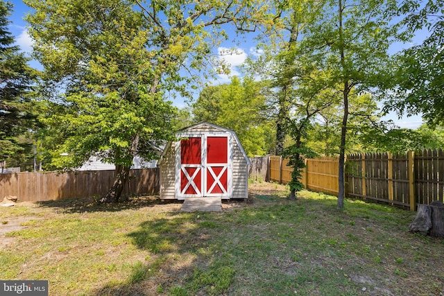 11312 Rawhide Rd, Lusby, MD 20657 - view of shed with a fenced backyard