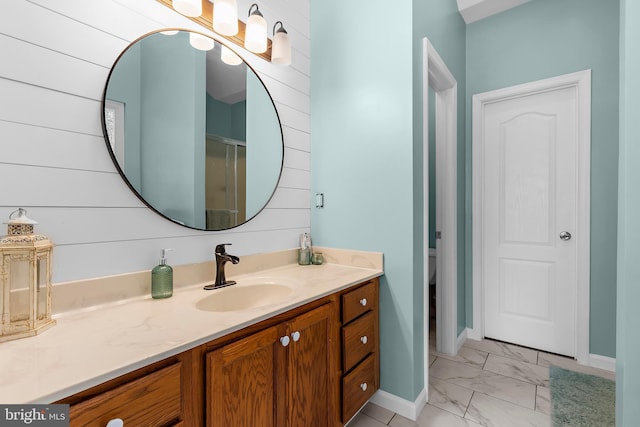 11312 Rawhide Rd, Lusby, MD 20657 - full bath with vanity, marble finish floor, baseboards, and toilet