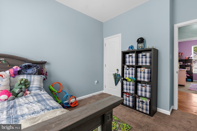 11312 Rawhide Rd, Lusby, MD 20657 - bedroom with baseboards and carpet