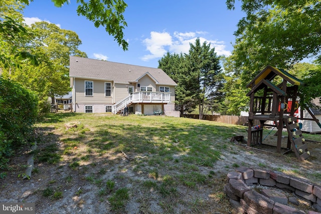 11312 Rawhide Rd, Lusby, MD 20657 - view of yard with a playground, fence, a wooden deck, and stairway