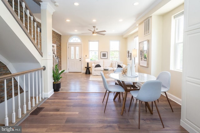 dining room featuring a ceiling fan, baseboards, recessed lighting, wood finished floors, and ornamental molding
