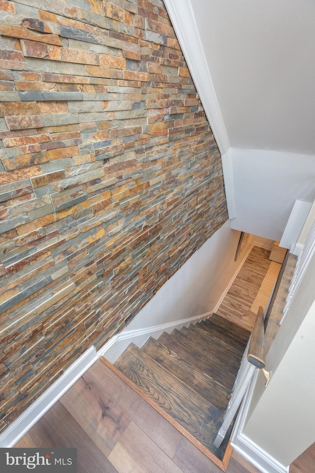 stairway with baseboards