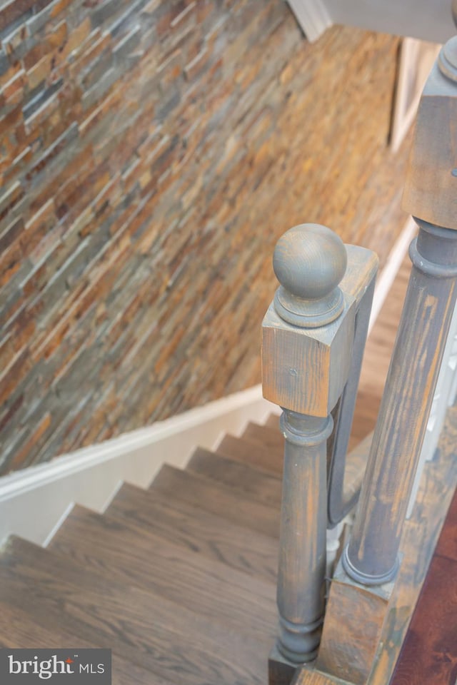 stairs with vaulted ceiling