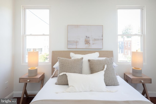 bedroom featuring baseboards