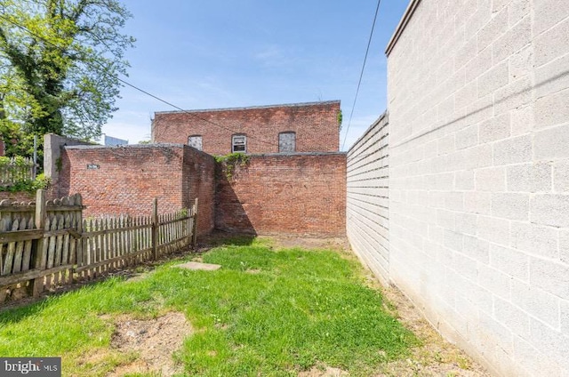 view of yard with fence