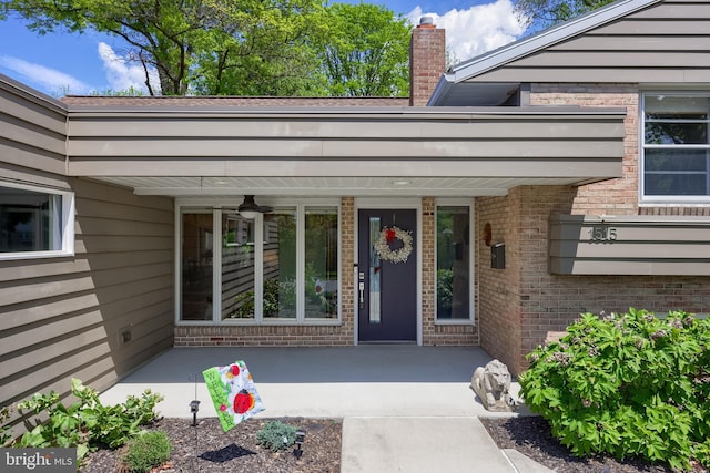 1515 Rockland St, Reading, PA 19604 - property entrance with brick siding and a chimney