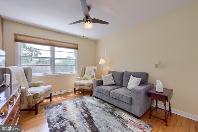 1515 Rockland St, Reading, PA 19604 - living area with ceiling fan, baseboards, and light wood-style floors