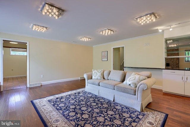 1515 Rockland St, Reading, PA 19604 - living area featuring ornamental molding, baseboards, wood finished floors, and healthy amount of natural light