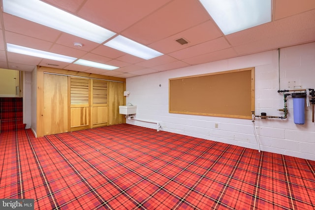 1515 Rockland St, Reading, PA 19604 - carpeted spare room featuring a sink, concrete block wall, and a drop ceiling