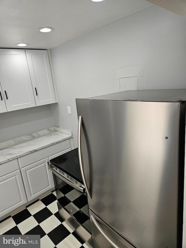 interior space featuring recessed lighting and tile patterned floors