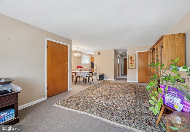 603 Bywood Ave, Upper Darby, PA 19082 - interior space with an inviting chandelier, carpet floors, and baseboards