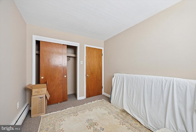 603 Bywood Ave, Upper Darby, PA 19082 - bedroom featuring baseboards, baseboard heating, a closet, and carpet