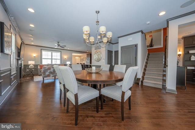 dining room featuring recessed lighting, stairway, dark wood-style floors, and ceiling fan with notable chandelier
