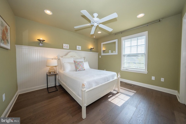 bedroom featuring baseboards, recessed lighting, and dark wood-style floors