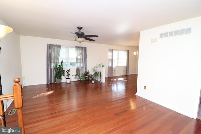 18 Stearrett Dr, Newark, DE 19702 - unfurnished room featuring wood finished floors, a chandelier, and a ceiling fan