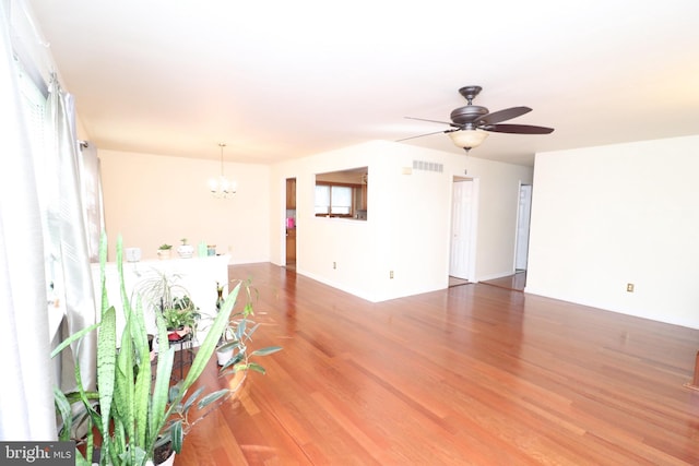 18 Stearrett Dr, Newark, DE 19702 - unfurnished room featuring a chandelier, wood finished floors, and a ceiling fan