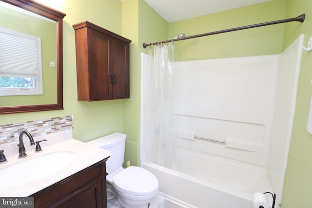 18 Stearrett Dr, Newark, DE 19702 - bathroom featuring decorative backsplash, vanity, toilet, and shower / bath combo with shower curtain