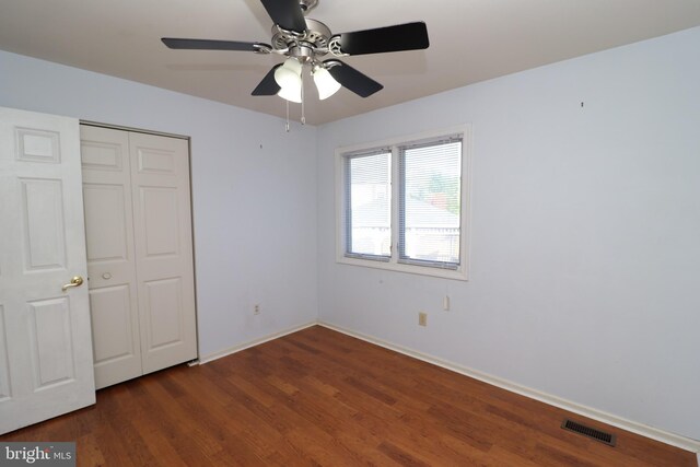 18 Stearrett Dr, Newark, DE 19702 - unfurnished bedroom with a closet, wood finished floors, baseboards, and a ceiling fan