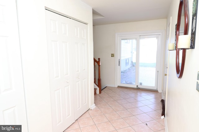 18 Stearrett Dr, Newark, DE 19702 - doorway with light tile patterned floors and baseboards