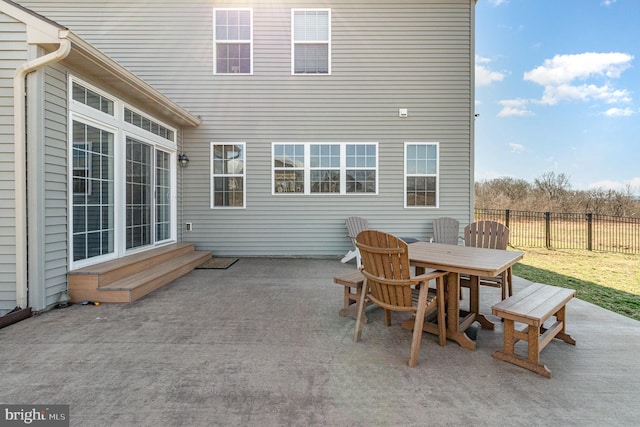view of patio / terrace featuring fence and outdoor dining space