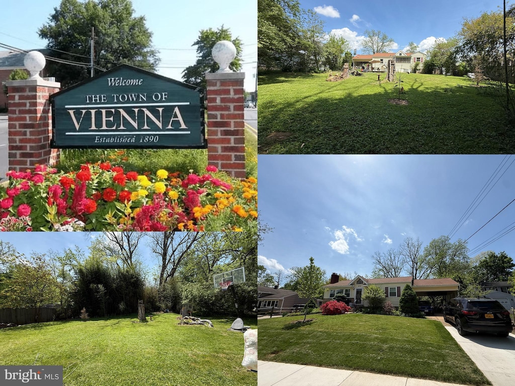 community / neighborhood sign with a yard