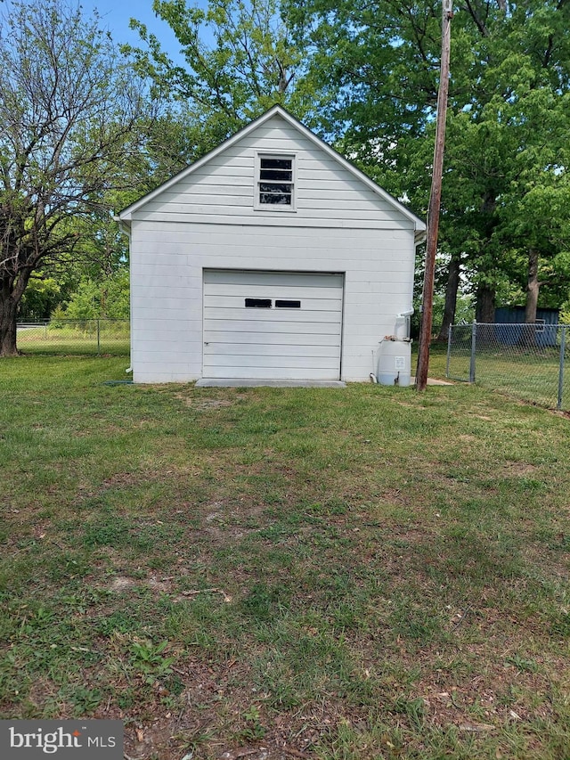 detached garage with fence