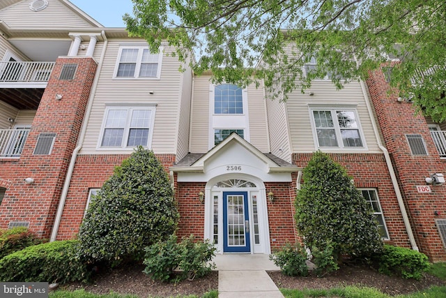 multi unit property featuring brick siding