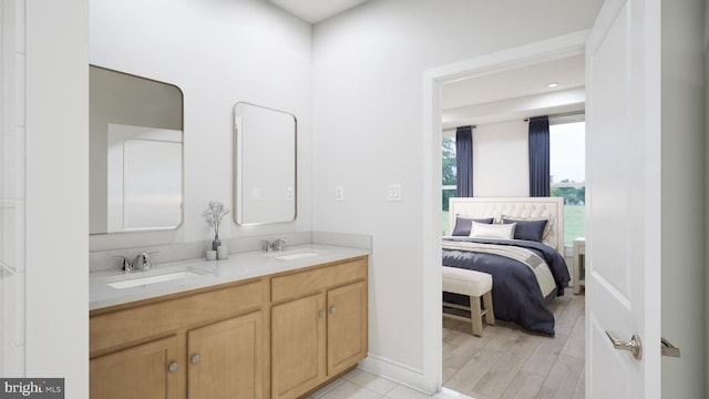 full bath featuring double vanity and a sink