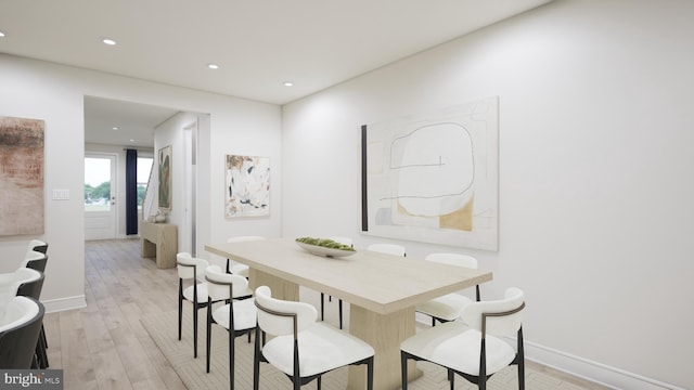 dining room featuring recessed lighting, baseboards, and light wood-type flooring