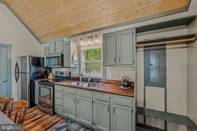 82 Vista River Ln, Paw Paw, WV 25434 - kitchen featuring butcher block countertops, wood ceiling, a sink, vaulted ceiling, and stainless steel appliances