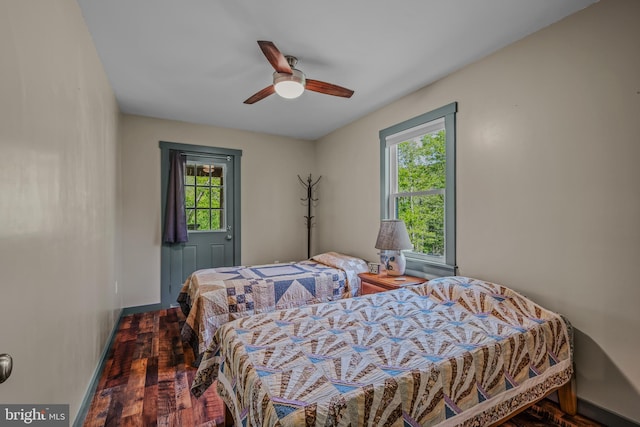 82 Vista River Ln, Paw Paw, WV 25434 - bedroom with ceiling fan, wood finished floors, baseboards, and multiple windows