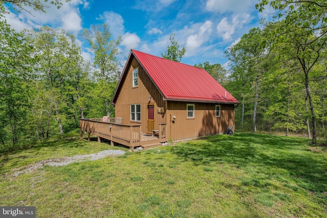 82 Vista River Ln, Paw Paw, WV 25434 - view of home's exterior with a yard, metal roof, and a deck