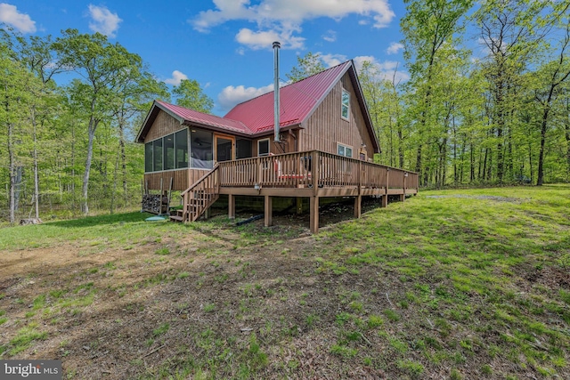 82 Vista River Ln, Paw Paw, WV 25434 - rear view of house featuring metal roof, stairway, a wooden deck, and a sunroom
