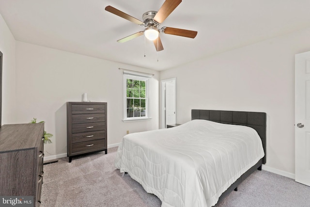 309 Camden Dr, Fredericksburg, VA 22405 - bedroom with carpet flooring, baseboards, and a ceiling fan