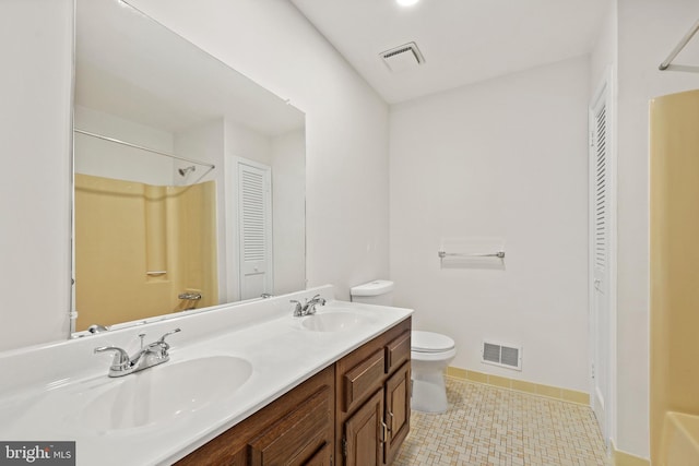 309 Camden Dr, Fredericksburg, VA 22405 - full bath featuring a closet, toilet, double vanity, tile patterned flooring, and baseboards
