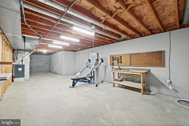 309 Camden Dr, Fredericksburg, VA 22405 - unfinished basement featuring a workshop area and concrete block wall