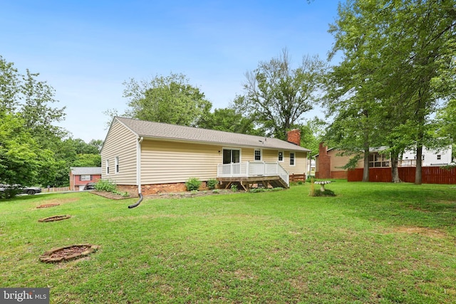 309 Camden Dr, Fredericksburg, VA 22405 - back of property with a deck and a chimney