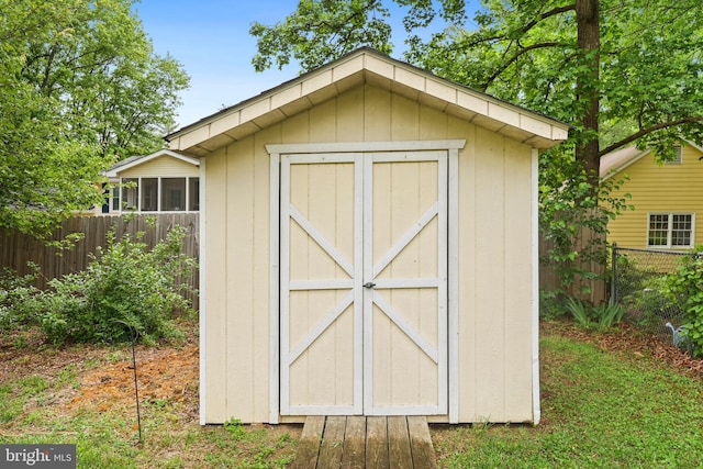 309 Camden Dr, Fredericksburg, VA 22405 - view of shed featuring fence and a sunroom
