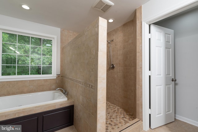 full bathroom with tiled shower, a garden tub, and tile patterned floors
