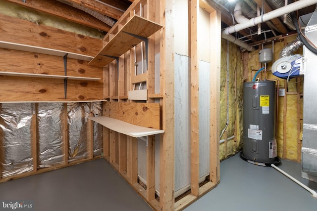 unfinished below grade area featuring electric water heater