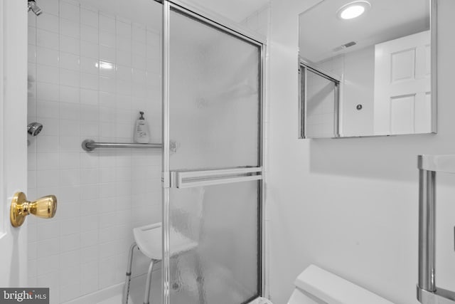 5025A S Convent Ln Unit 142, Philadelphia, PA 19114 - bathroom with toilet and an enclosed shower