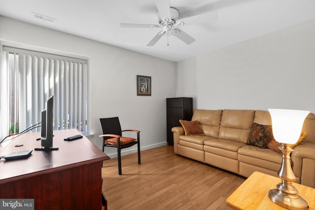 5025A S Convent Ln Unit 142, Philadelphia, PA 19114 - living room featuring light wood-type flooring, baseboards, and ceiling fan
