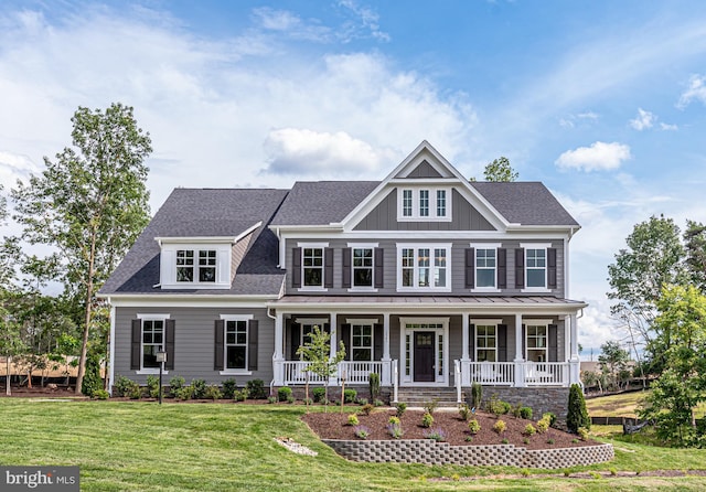 3919 Pineland St, Fairfax, VA 22031 - view of front of house with a porch, a shingled roof, board and batten siding, and a front yard