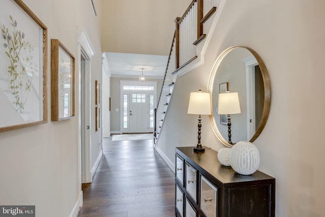 3919 Pineland St, Fairfax, VA 22031 - corridor featuring crown molding, baseboards, wood finished floors, and stairway