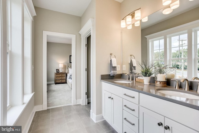 3919 Pineland St, Fairfax, VA 22031 - ensuite bathroom with tile patterned flooring, a sink, connected bathroom, and double vanity